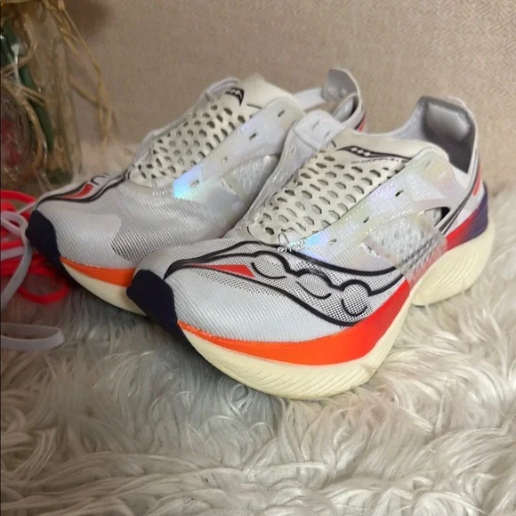 Saucony White and Orange Athletic Shoes with PWRRUN Cushioning - Picture 3 of 8